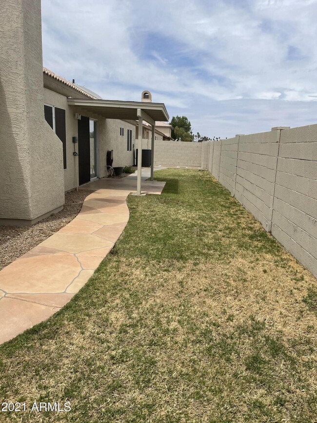 Building Photo - 9002 W Caribbean Ln