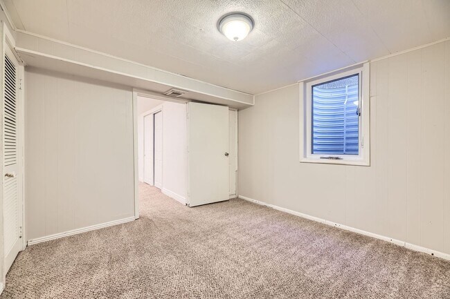 Building Photo - Spacious Home w/Large Backyard Only Blocks...