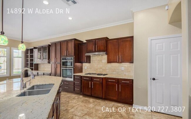 Building Photo - 14892 W Aldea Dr S