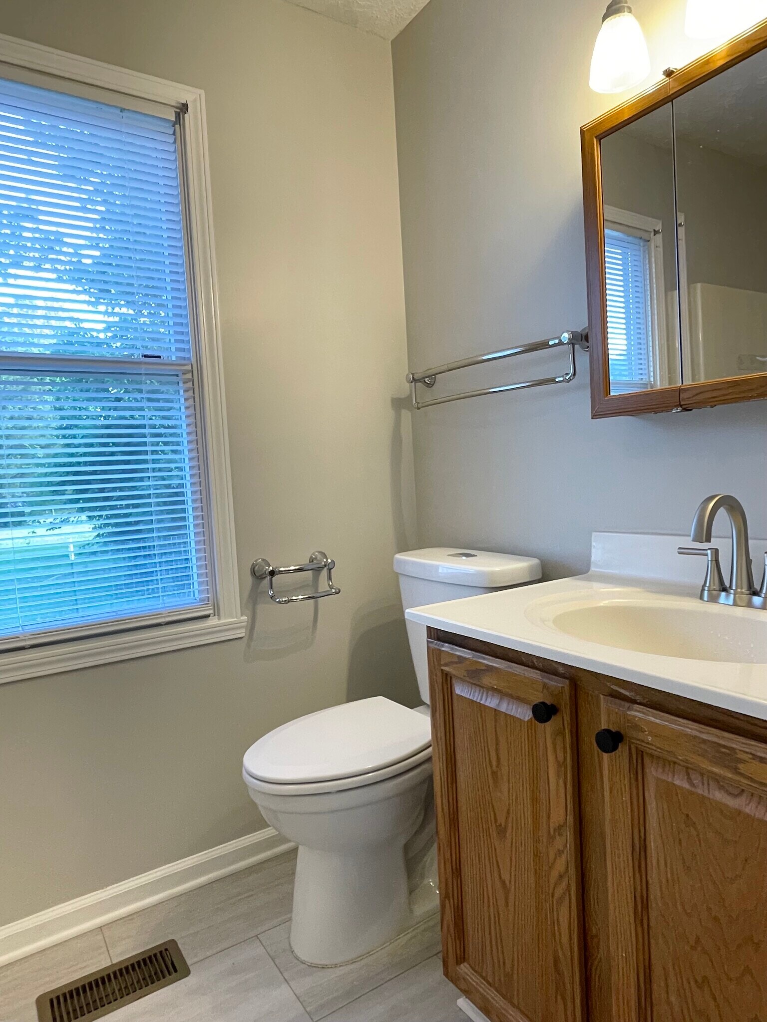 Primary bathroom w/ new floor - 10521 Cornell Ave
