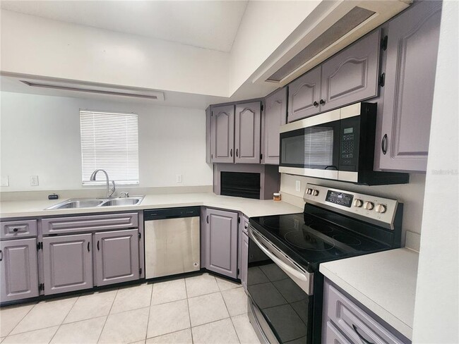 Building Photo - 9392 N Sandree Dr