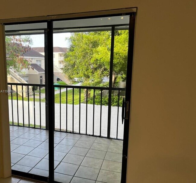 Building Photo - 18965 NW 62nd Ave