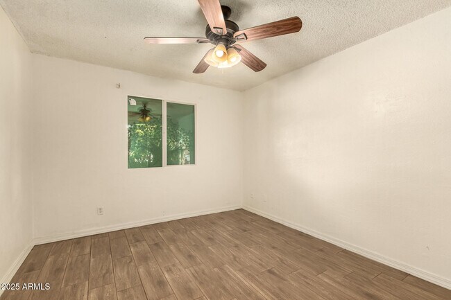 Building Photo - 3316 N 63rd Ave