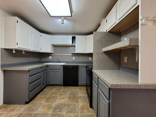 Building Photo - Bright Four-Bedroom Home with Spacious Outdoor Area