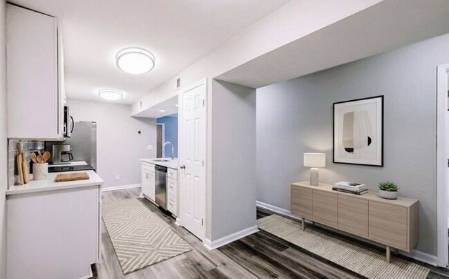 Building Photo - Spacious 2-Bedroom Elite Apartment with Private Balconies & Washer/Dryer