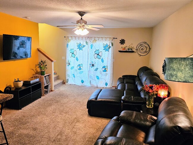 Main floor living space with plenty of natural light. - 212 Alydar Dr