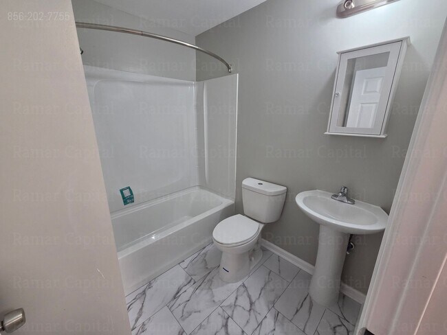 Building Photo - Charming 3-Bedroom Home with Spacious Gated Yard