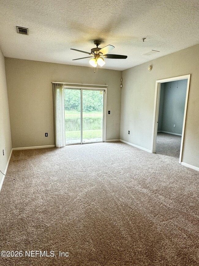 Building Photo - 6985 Ortega Woods Dr