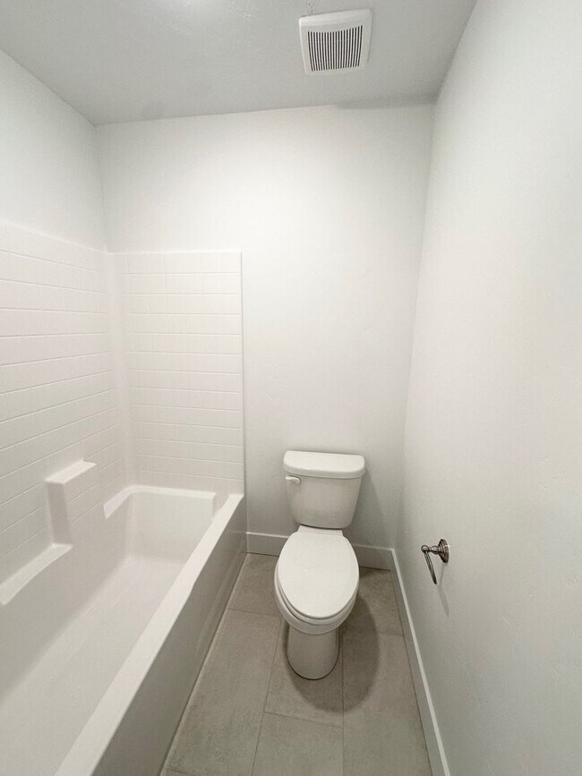 Building Photo - Spacious Luxury Townhome Designed for Modern Living
