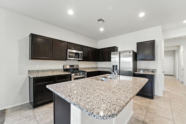 Building Photo - Rare Find! Spacious 3-Bed, 2-Bath + 3-Car ...