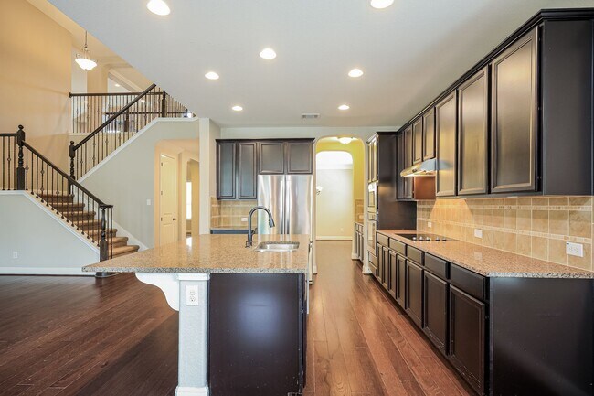 Building Photo - 5 Bedrooms and 3+ Living Spaces!