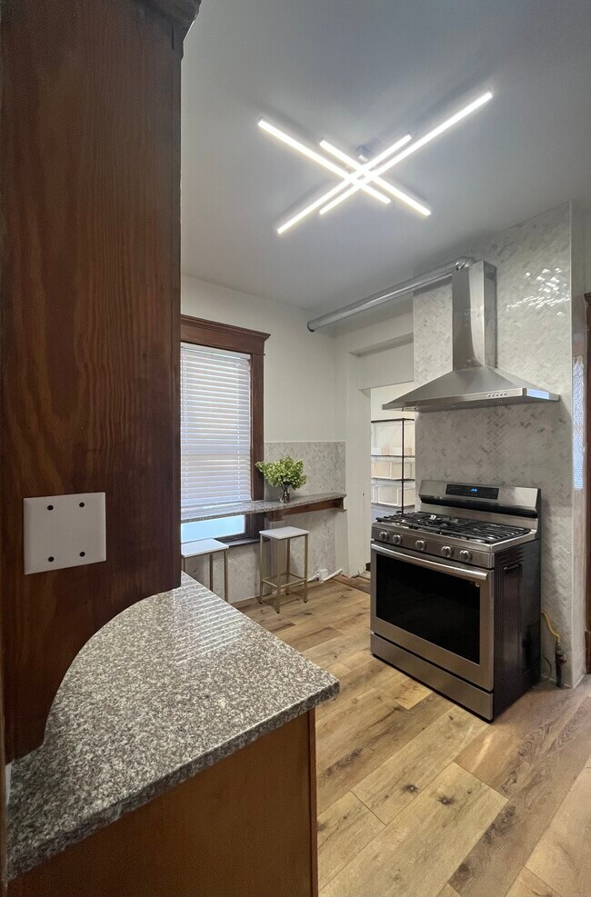 NEW RANGE HOD AND NEW MARBLE BACKSPLASH - 32 E Northwood Ave