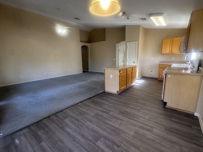 Building Photo - Rare single-level home offers 5 bedrooms and a versatile floor plan designed for comfortable living