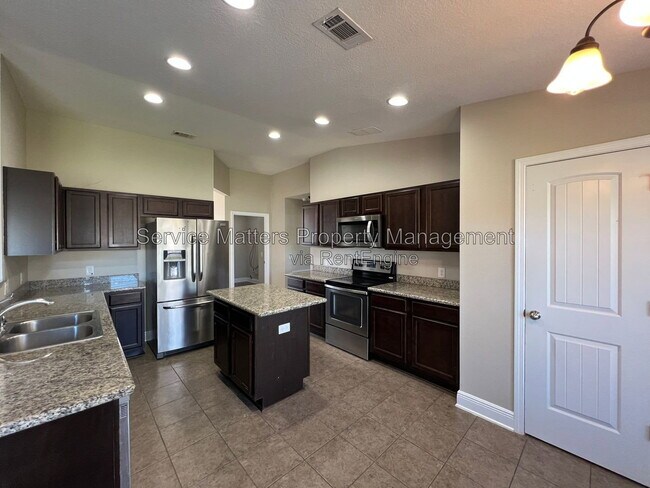 Building Photo - 7045 Harvest Way