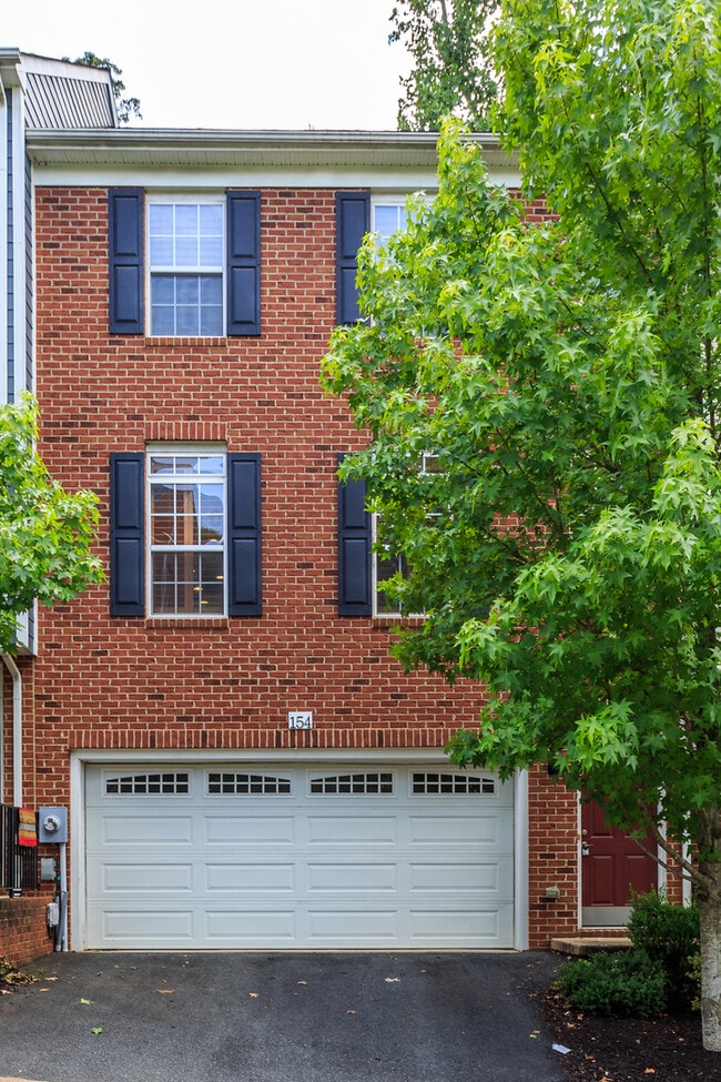 Building Photo - Beautiful 3-Bedroom Brookwood Townhome with 2-Car Garage — Don't Delay!