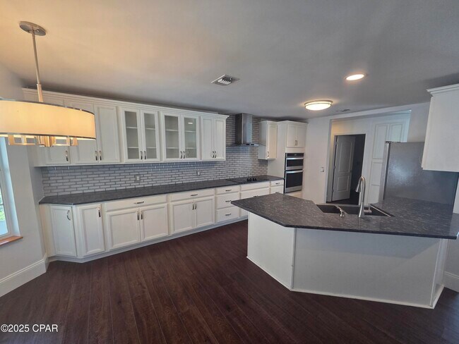 Building Photo - 1303 Sutherland Ct