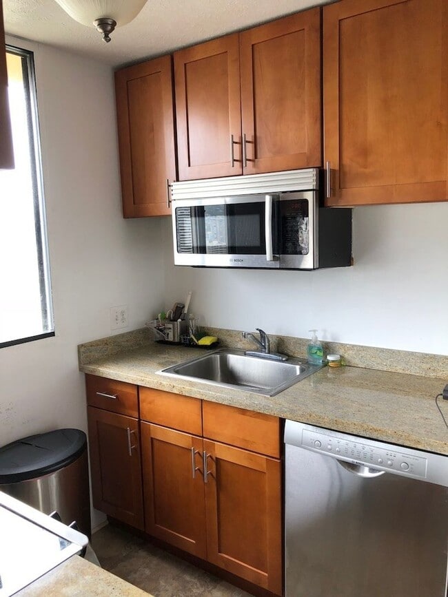 Building Photo - Furnished w/ ALL Utilities included!! Upgraded appliances & huge lanai