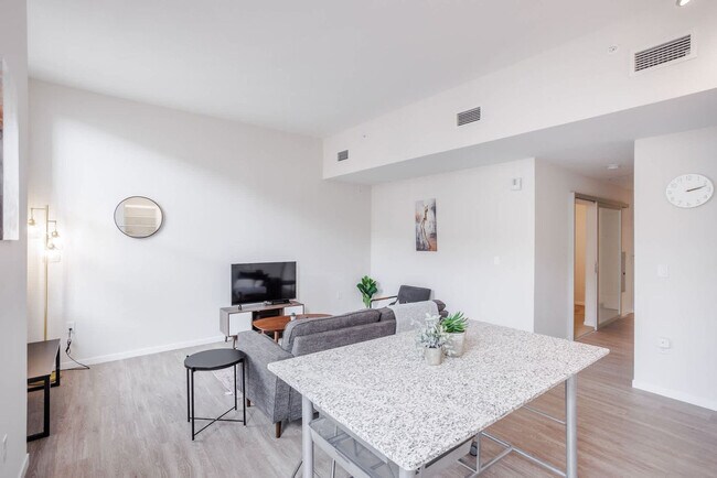 Building Photo - 9-JAN-JAN E 4th St