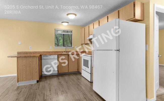 Building Photo - Peaceful Living in University Place – Bright, Spacious & Move-In Ready + $300 Move-In Special!