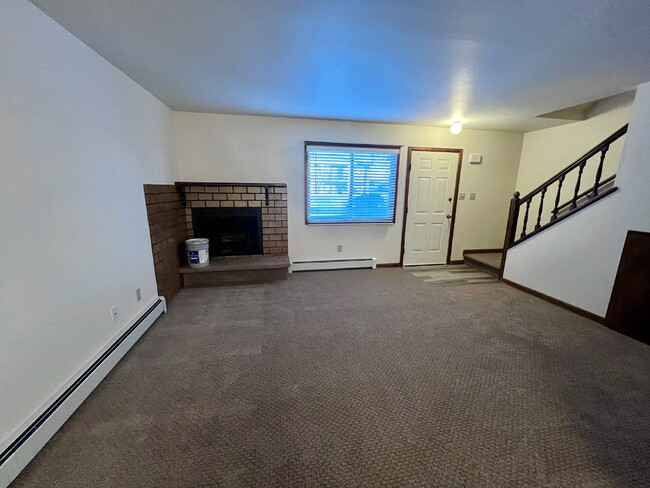 Building Photo - "Cozy 2-Bed Condo with Fireplace Oasis in ...