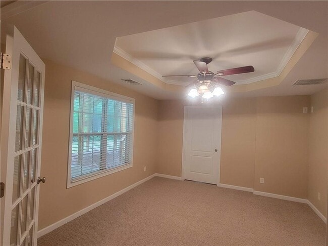 Building Photo - 5555 Holly Springs Dr