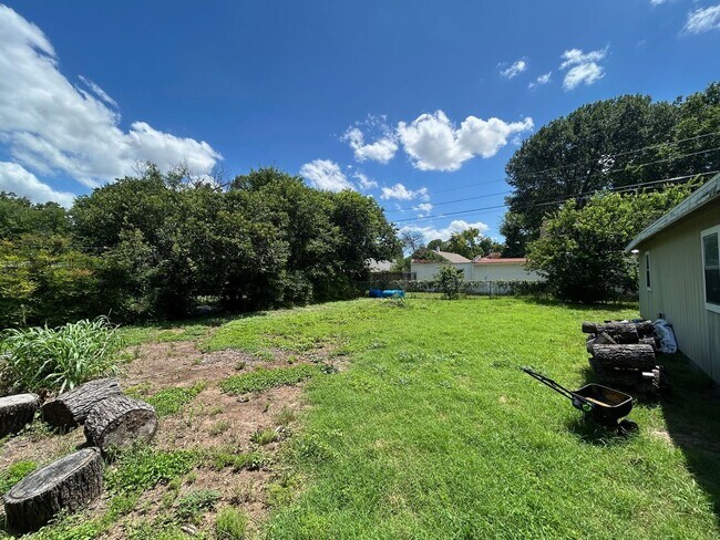 Building Photo - Spacious Corner Lot Charm