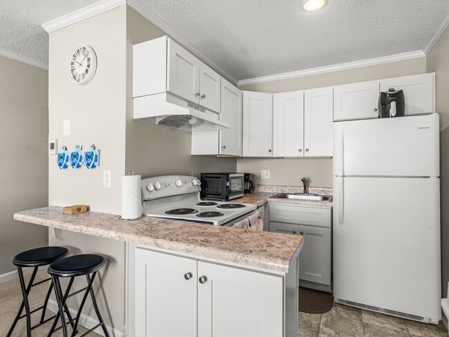 Building Photo - Furnished avail @ Topsail Reef Condos - OCEANFRONT