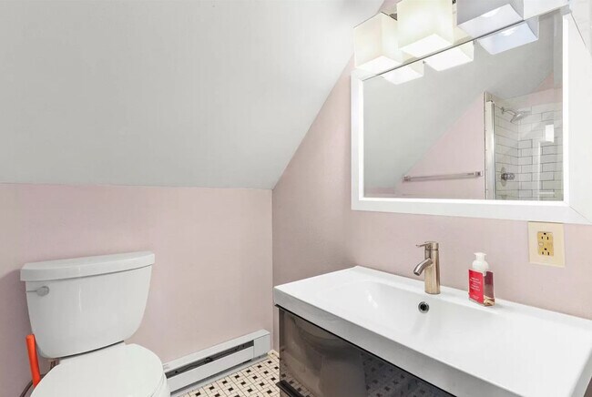 3rd floor 3/4 bath with tiled shower. - 707 S Dickinson St