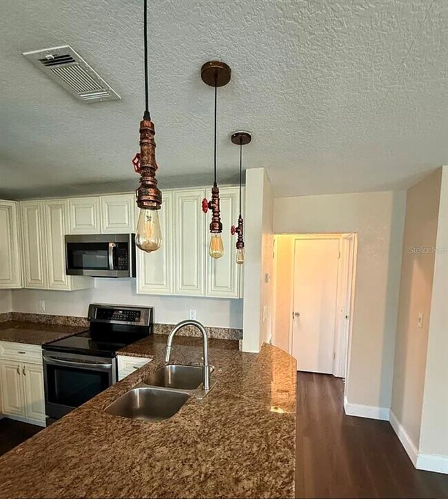 Building Photo - 2735 Boca Ciega Dr N