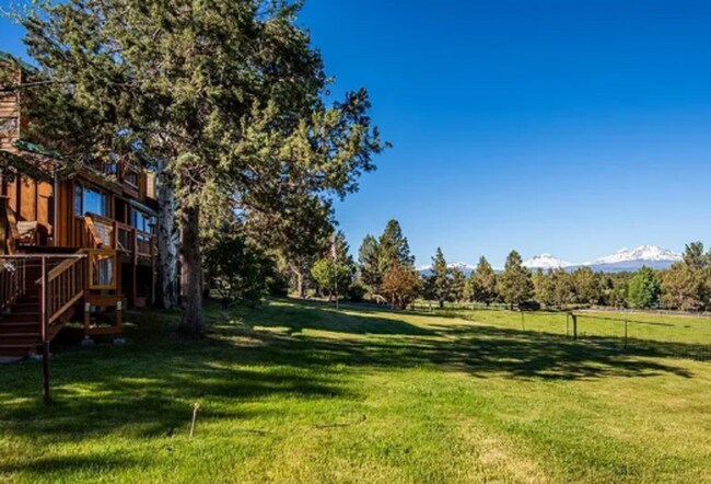Building Photo - Custom Rustic 4-Bdr on beautiful 5 acres with Greenhouse in Sisters!