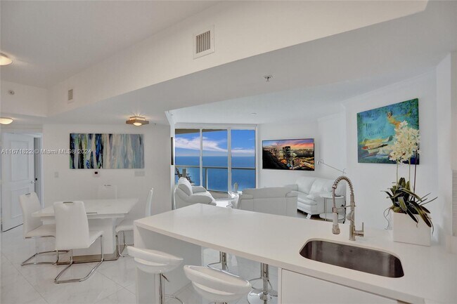 Building Photo - 16699 Collins Ave