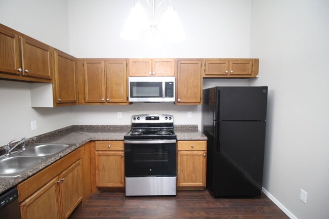 Building Photo - Ready Now Updated Two Bedroom Apartment with Wood Look Flooring and New Appliances & ½ OFF FIRST ...