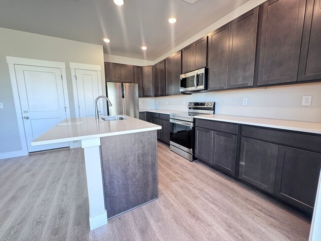 Building Photo - Sage Meadows II Townhomes — Lakeside Living Meets Modern Comfort!