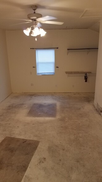 Converted garage, living room/bonus room - 605 Bennett
