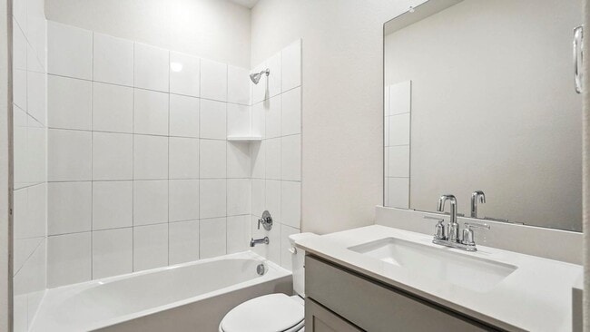 Building Photo - Welcome to this stunning 4-bed, 2-bath home with flex space, style, and comfort throughout!