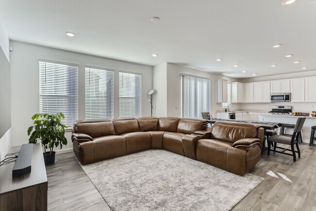 Building Photo - Stunning New Build in Aurora with Sleek Fi...