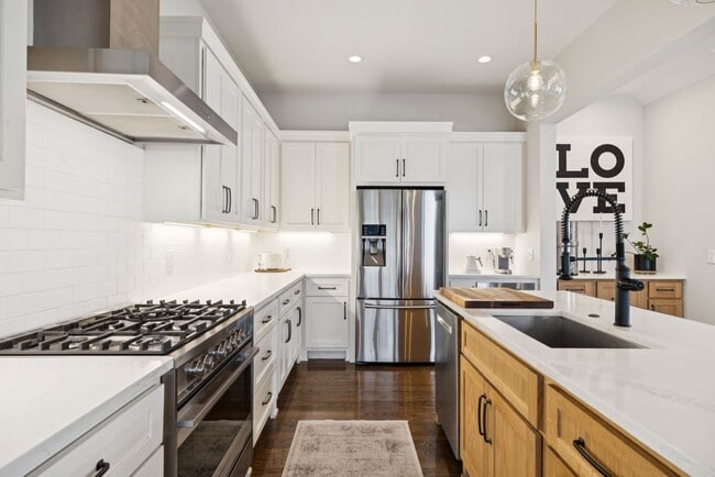 Building Photo - Experience elevated living in this beautifully crafted brick residence located in the heart of Ed...