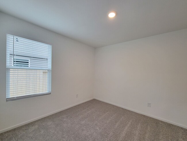 Building Photo - This lovely single-level home showcases a spacious open floorplan shared between the kitchen, din...