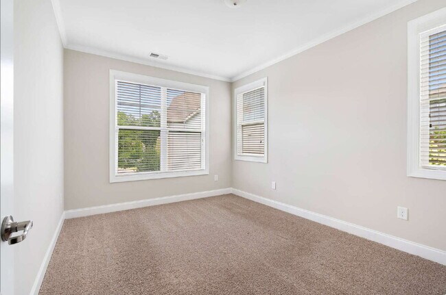 Building Photo - Luxurious 4-Bedroom Retreat with Third Floor Bonus Room & Fenced-in Backyard