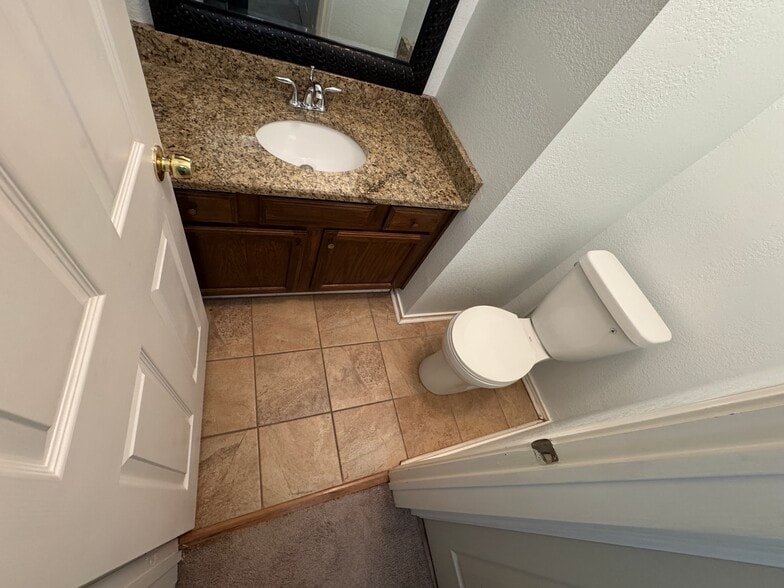 Powder room on main floor - 3905 Picato Dr