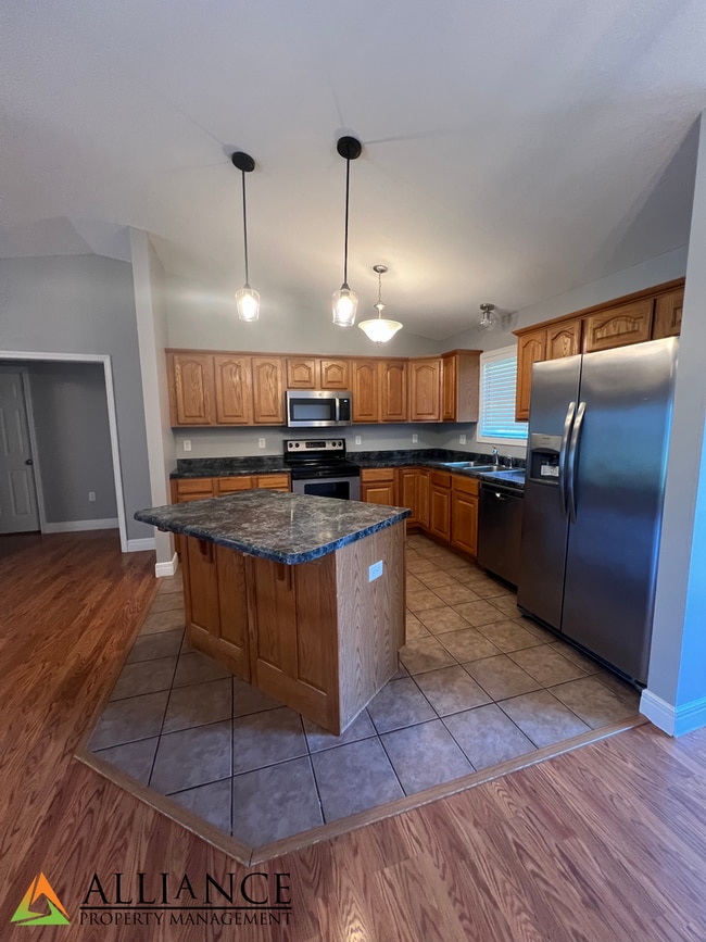 Building Photo - NEWLY PAINTED! Walk Out Basement & Much, Much More!