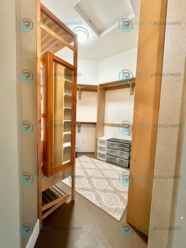 Building Photo - Open Kitchen, Expansive Living, and Covered Patio in Tranquil South Reno Near Trails, Parks & Sho...