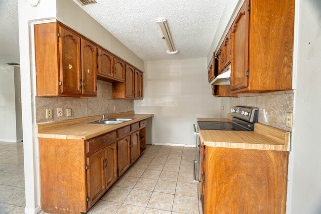 Building Photo - 4902 Marcella Ave