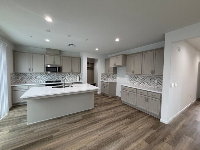 Building Photo - Spacious Brand New 4-Bedroom, 3-Bathroom Home with Solar & Low-Maintenance Yard