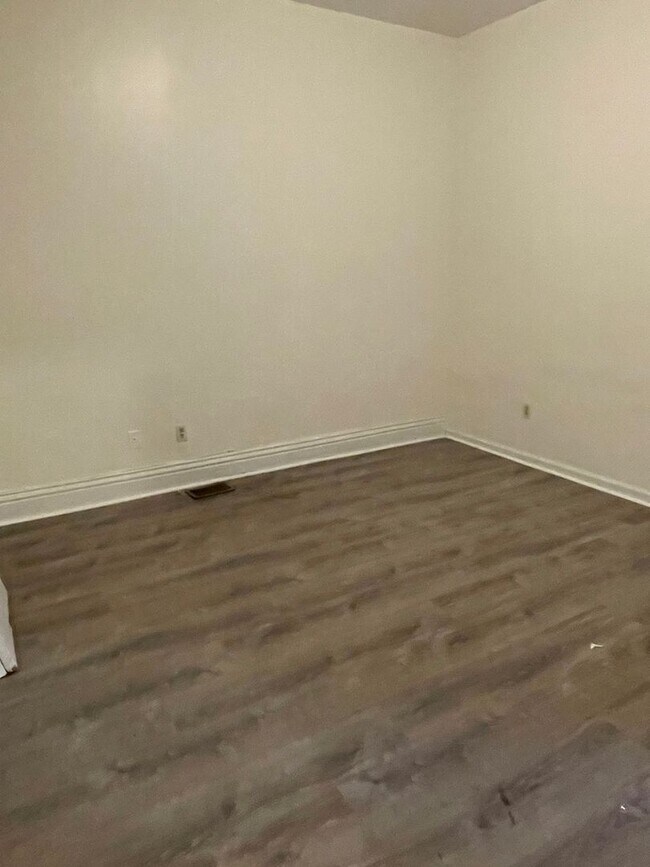 Building Photo - Updated three bedroom two bathroom home in...