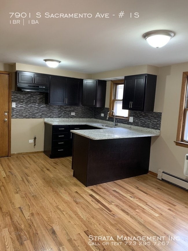 Building Photo - 7901 S Sacramento # 1S - $1,100/mo (1br/1b)