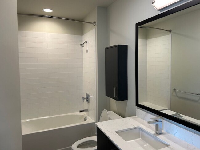 Building Photo - Roomy, 612 Square Foot, 1-Bedroom Home wit...