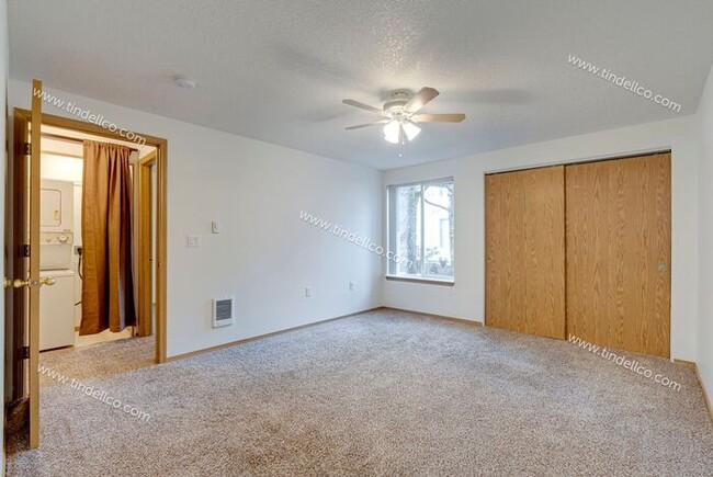 Building Photo - Spacious Pet-Friendly Ground Level Unit w/...