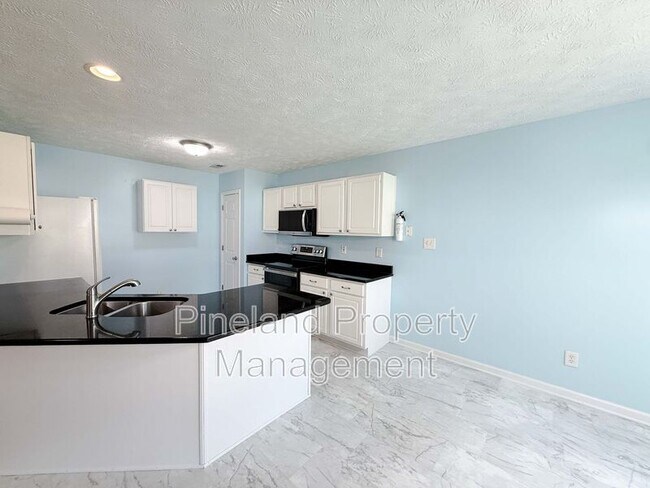 Building Photo - 219 Woodland Dr