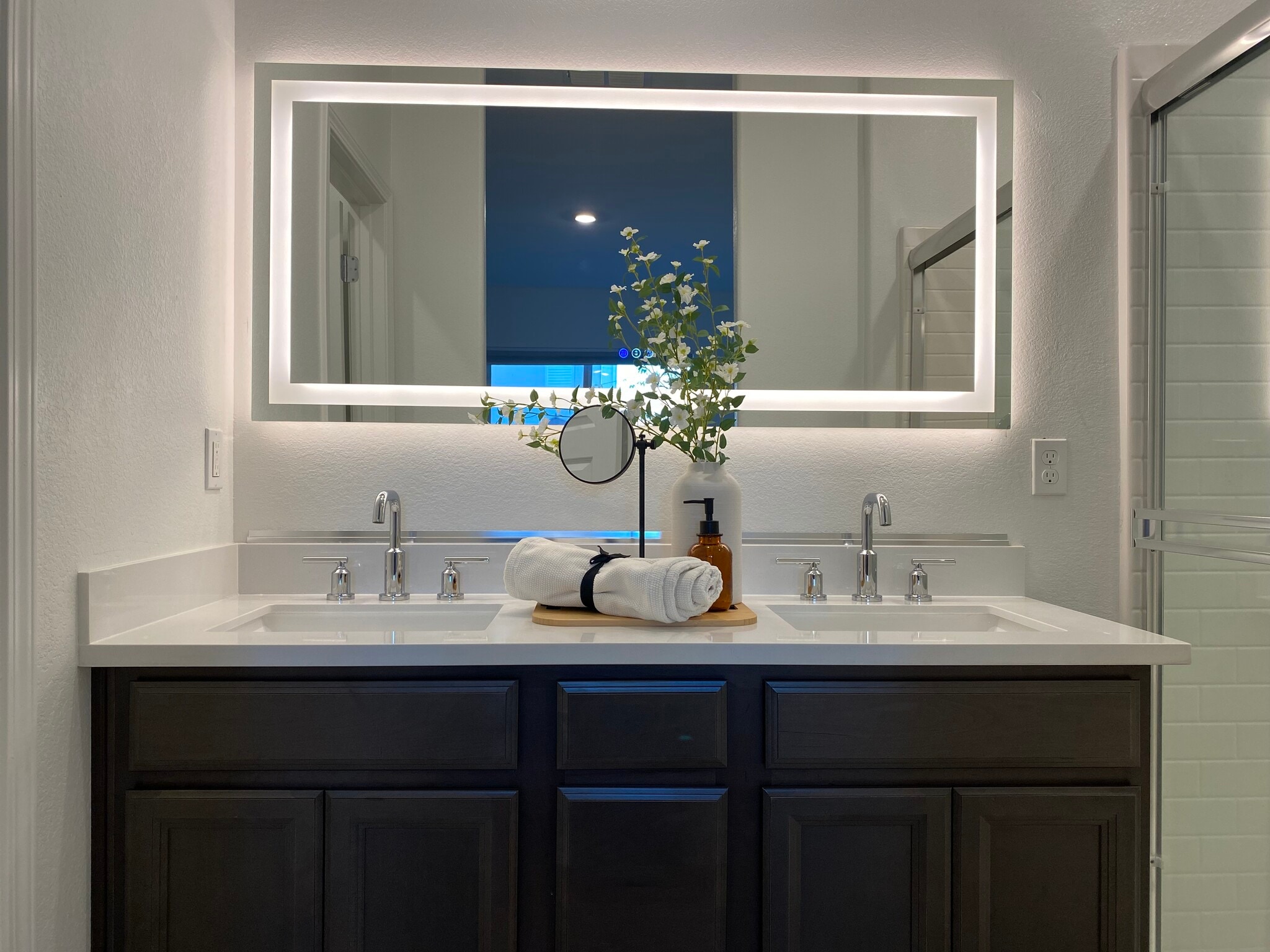 Owner’s Suite private bath with LED mirror and dual vanity - 1683 Sandoval Dr